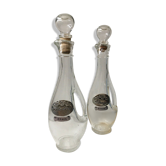 Lot of 2 old glass and tin condiment service bottles and corks