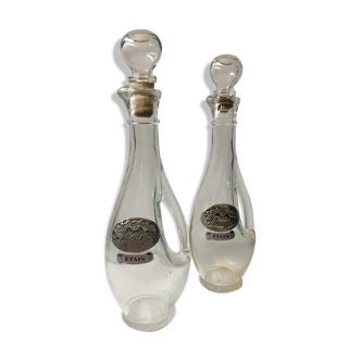 Lot of 2 old glass and tin condiment service bottles and corks