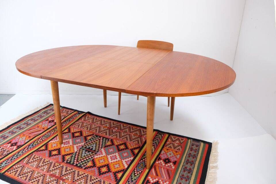 1960s/70s-style teak dining table by ASKO, with a retro vintage design.