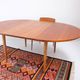 1960s/70s-style teak dining table by ASKO, with a retro vintage design.