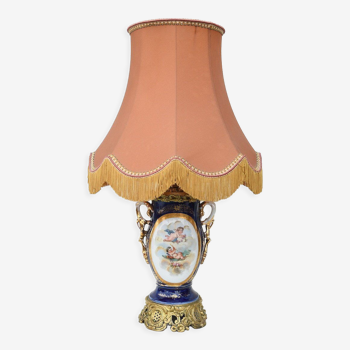 Paris porcelain lamp decorated with flowers and putti