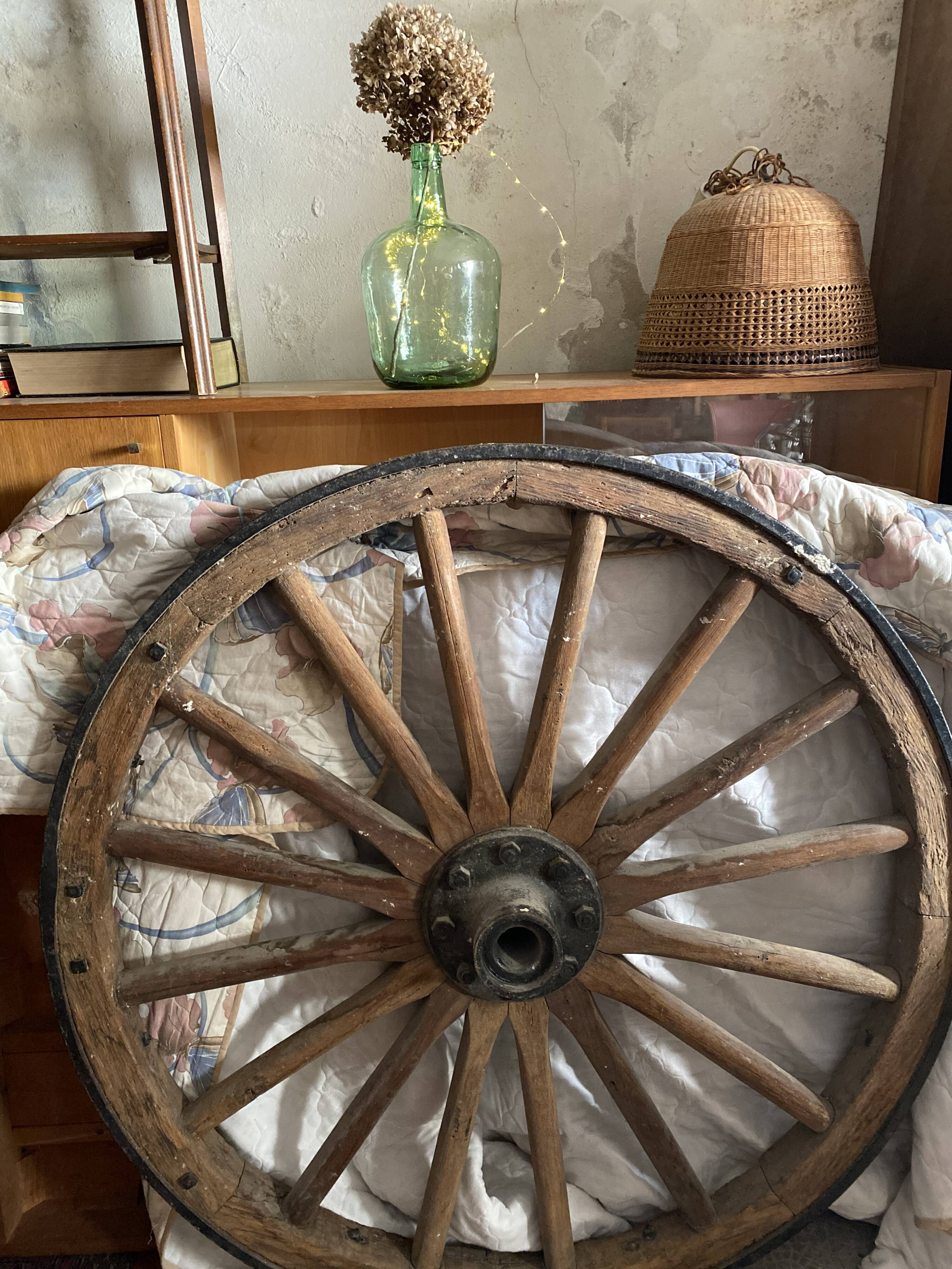 Wheel of wooden and cast iron cart