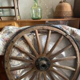 Wheel of wooden and cast iron cart