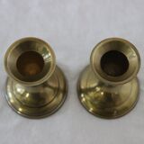 Small golden metal candle holders
