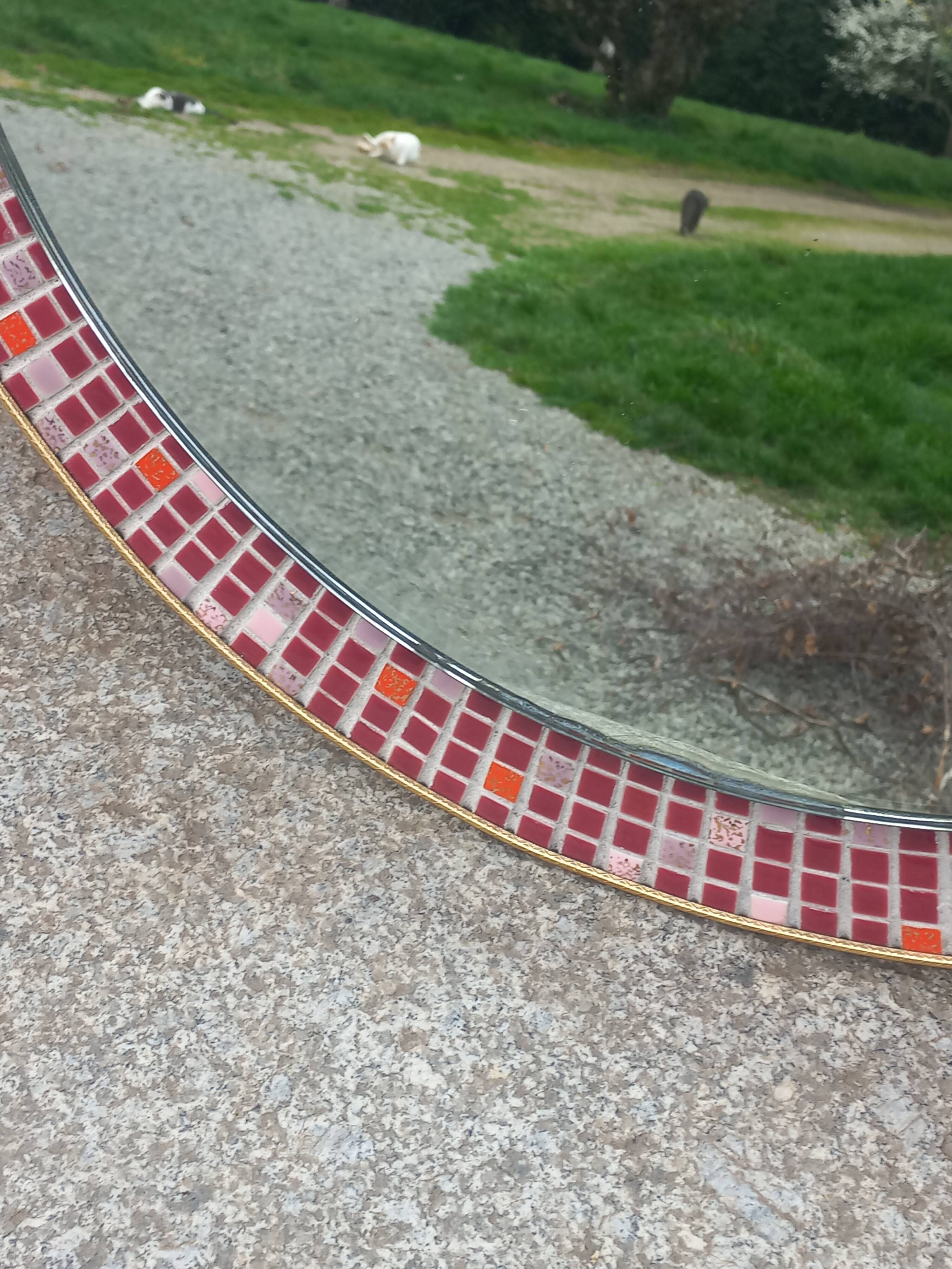 Vintage ceramic mirror from the 1960s.