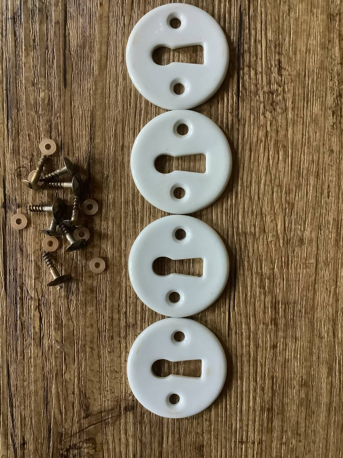 Set of 4 porcelain lock rosettes with gold screws – vintage