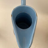 Blue watering can