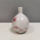 A vase in crackled porcelain with pink decoration. Germany 1930s