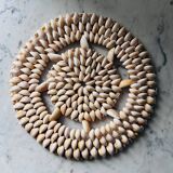 Trivet made of seashells