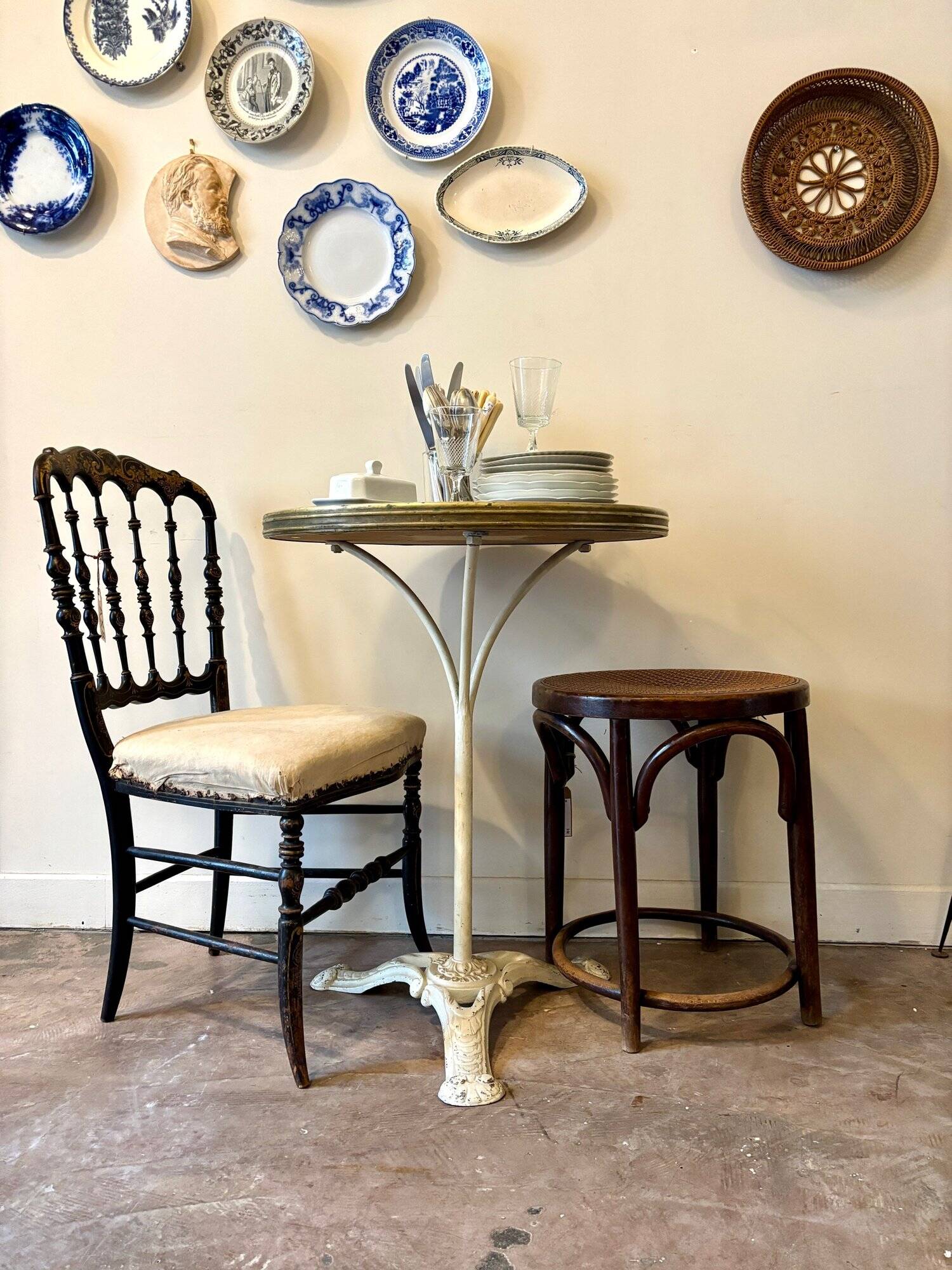 Bistro table in gray cast iron and brown melamine