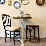 Bistro table in gray cast iron and brown melamine