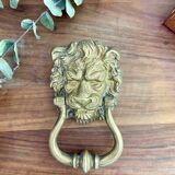 Bronze lion door knocker