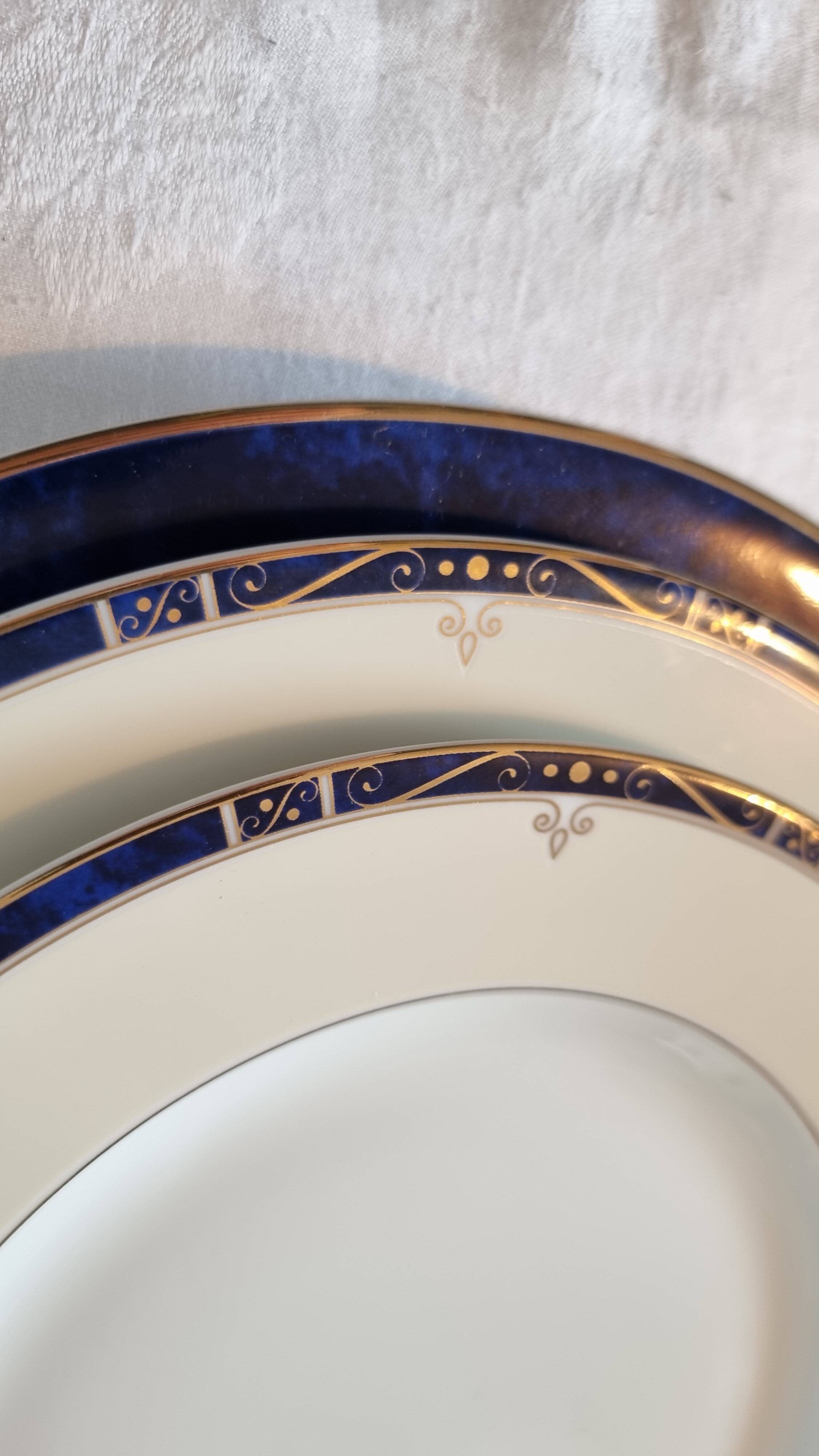 18-piece porcelain dinnerware set from Limoges by Philippe Deshoulières.
