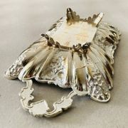 St Louis XV style letter tray, empty pocket, 20th century, in repoussé metal.
