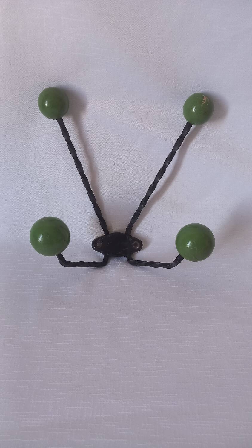 Vintage metal and wooden ball coat rack