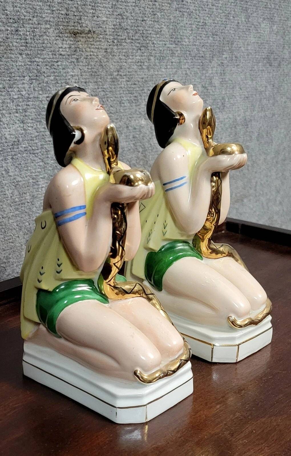 Pair of polychrome porcelain night light statues in Art Nouveau style