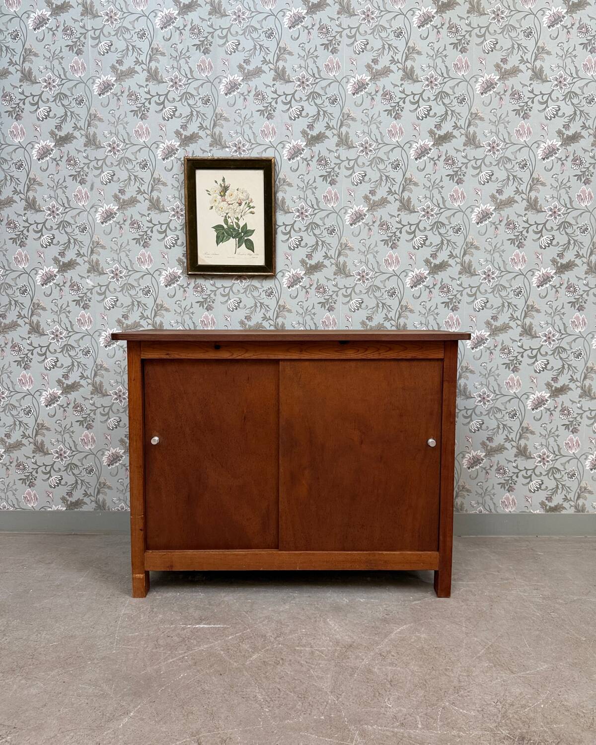 Vintage sideboard with sliding doors
