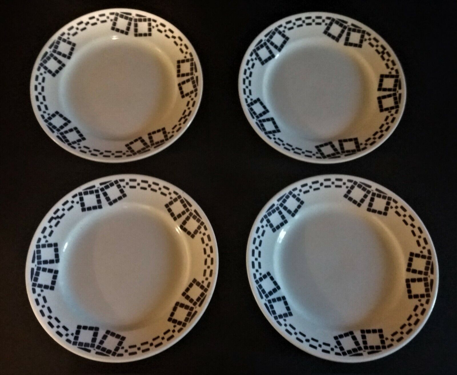 Series of four flat earthenware plates P.B. Rochechouart Limoges model Anna