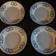 Series of four flat earthenware plates P.B. Rochechouart Limoges model Anna