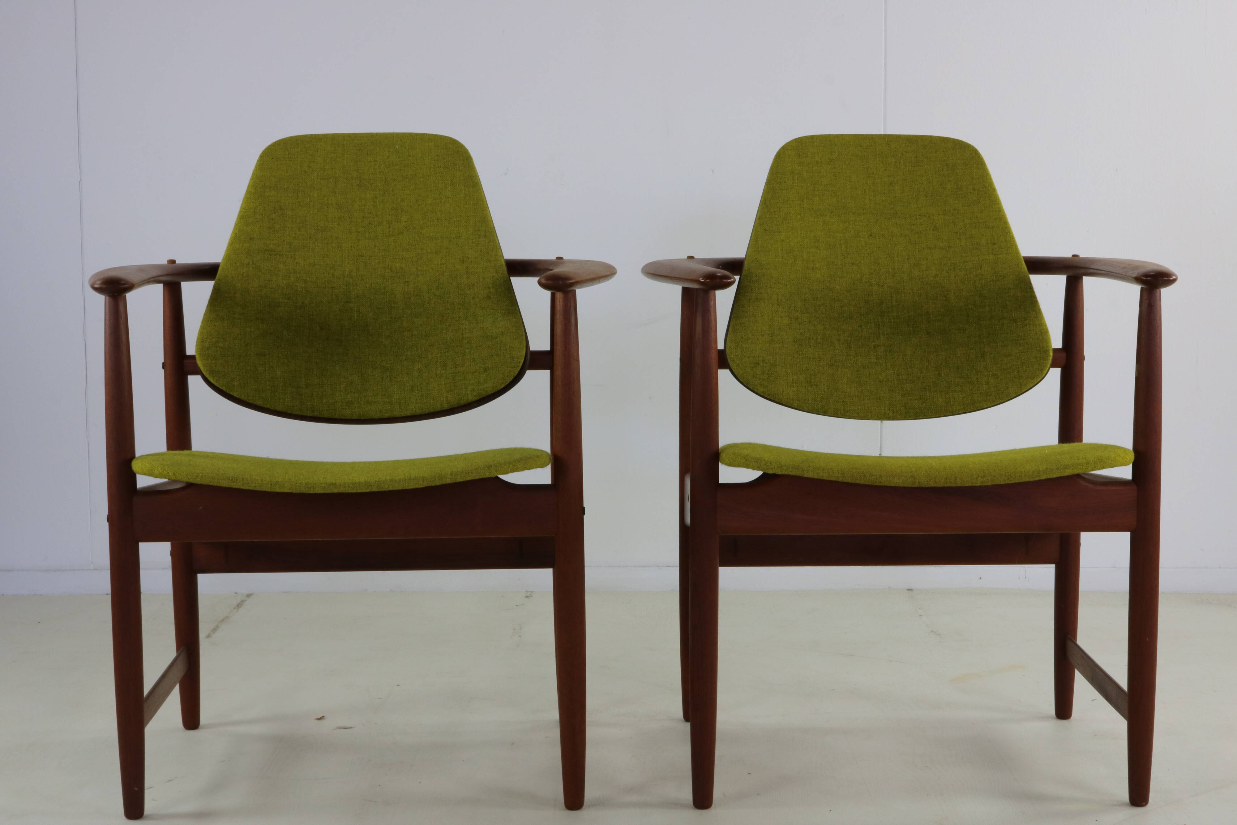 Two Danish design lounge arm chairs by Arne Hovmand Olsen