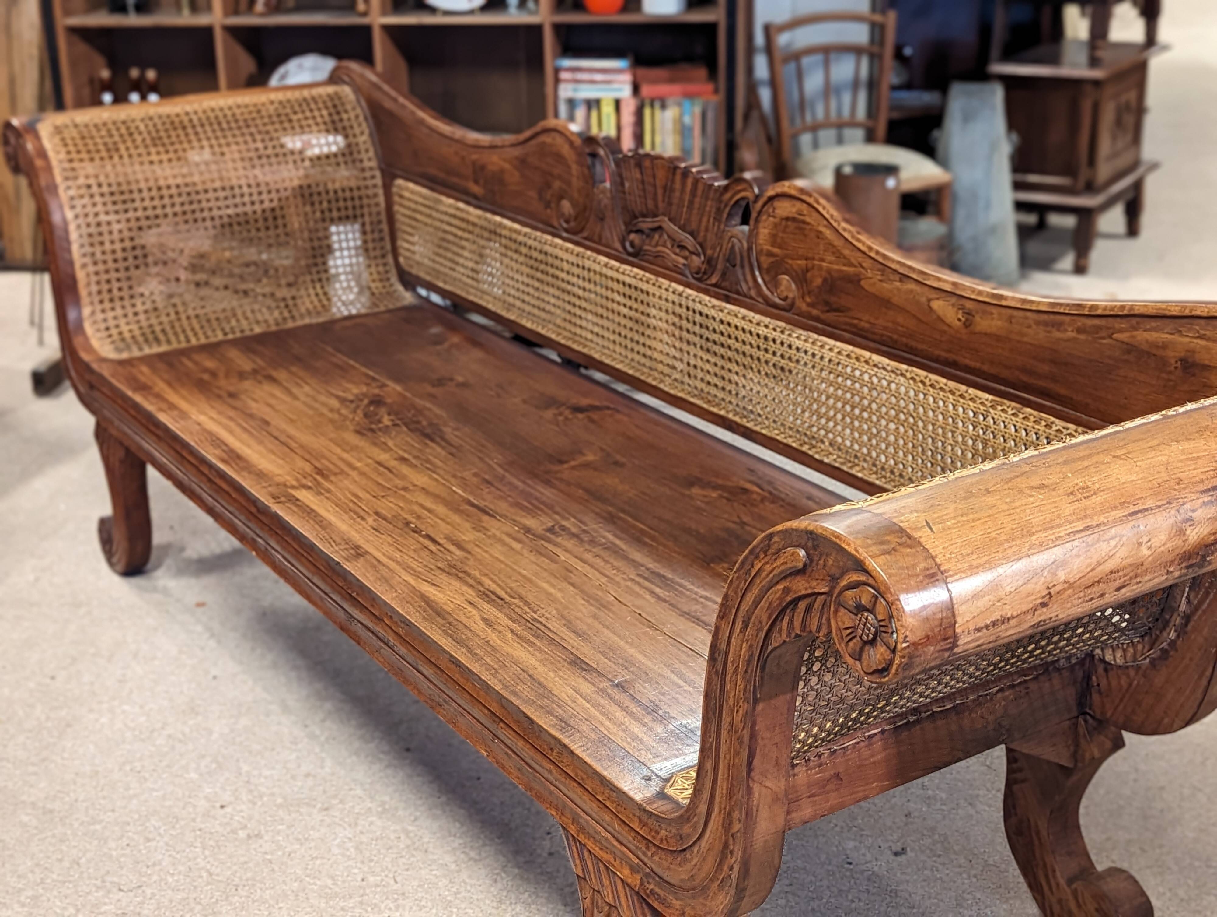 Large colonial caned bench