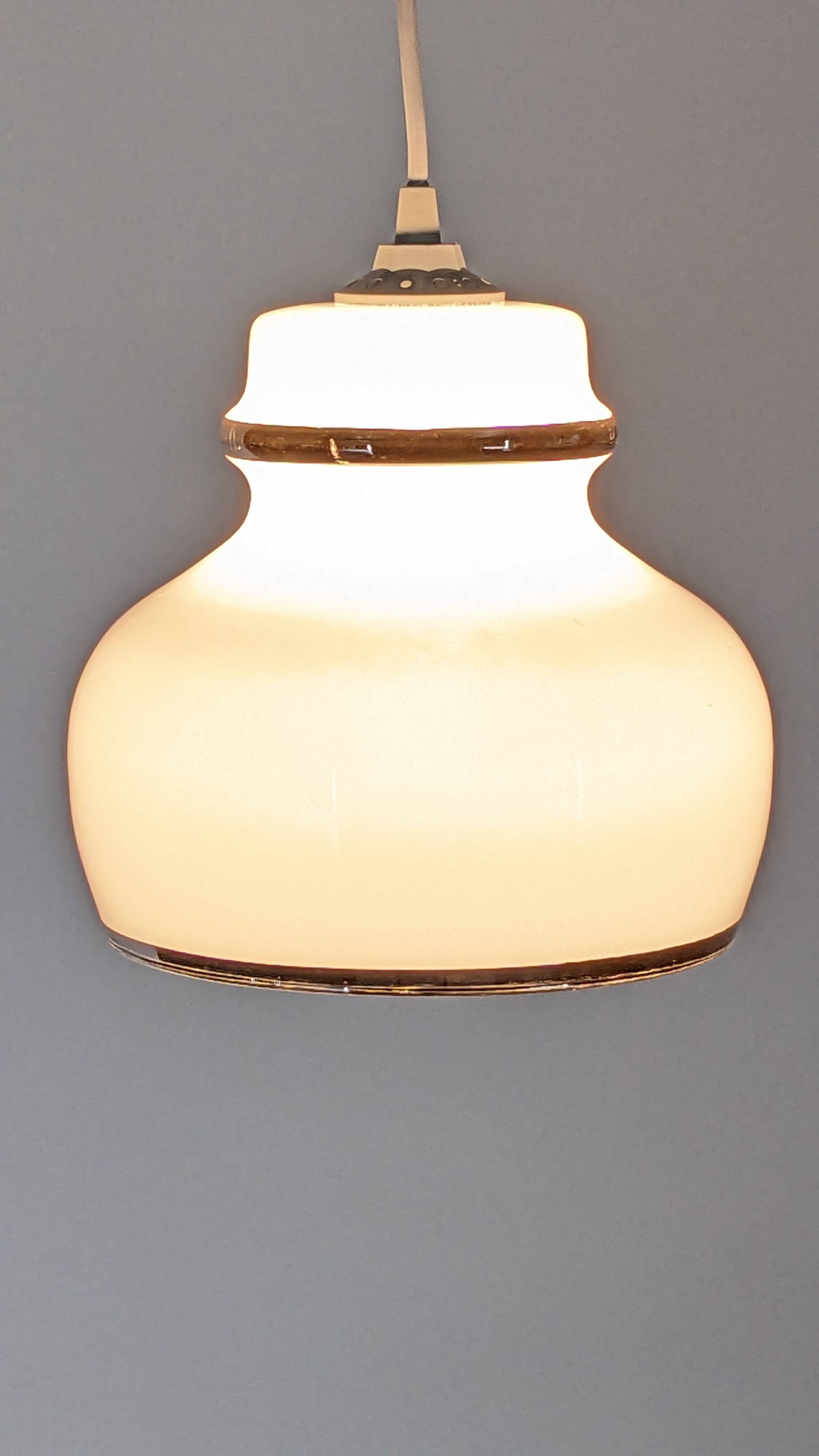 Suspension in white opaline with chrome trim, France circa 1970.