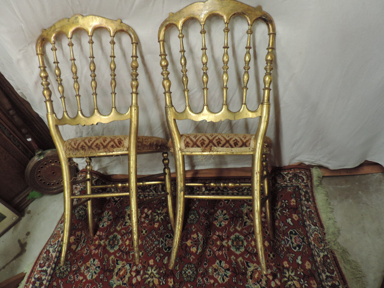 Paire de chaises en bois doré NIII