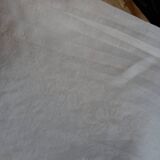 Beautiful tablecloth in linen monogrammed TA