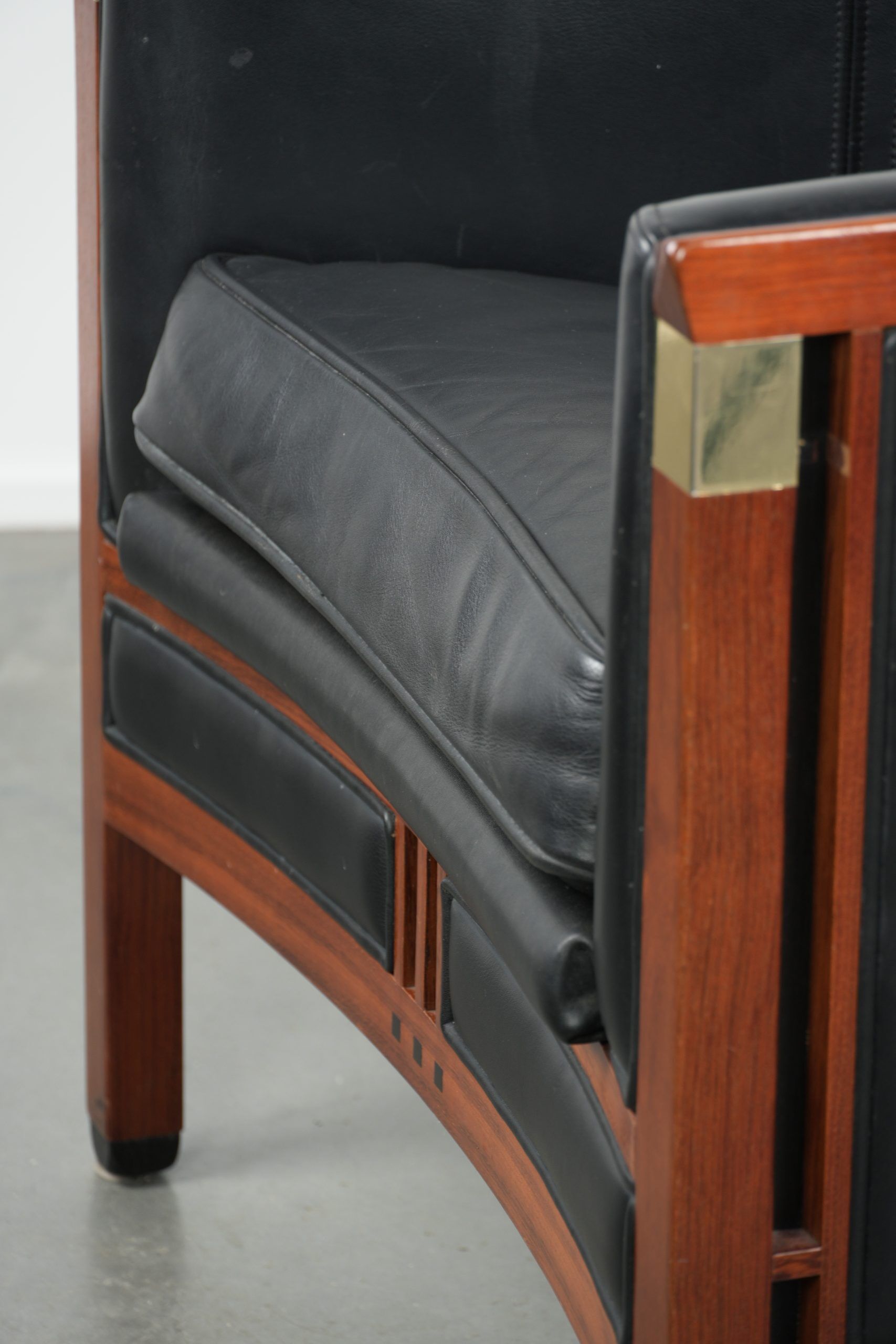 Black leather and wooden Art Deco design armchair