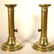 Pair of brass push candlesticks