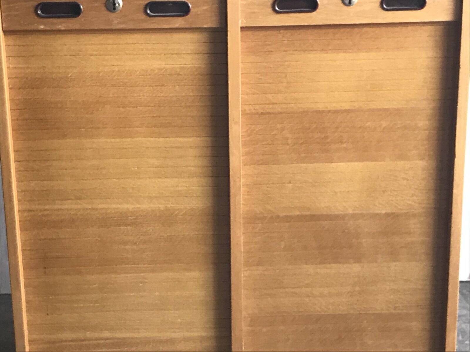 Mid-century industrial haberdashery cabinet in brown oak, double tambour, 1950s.