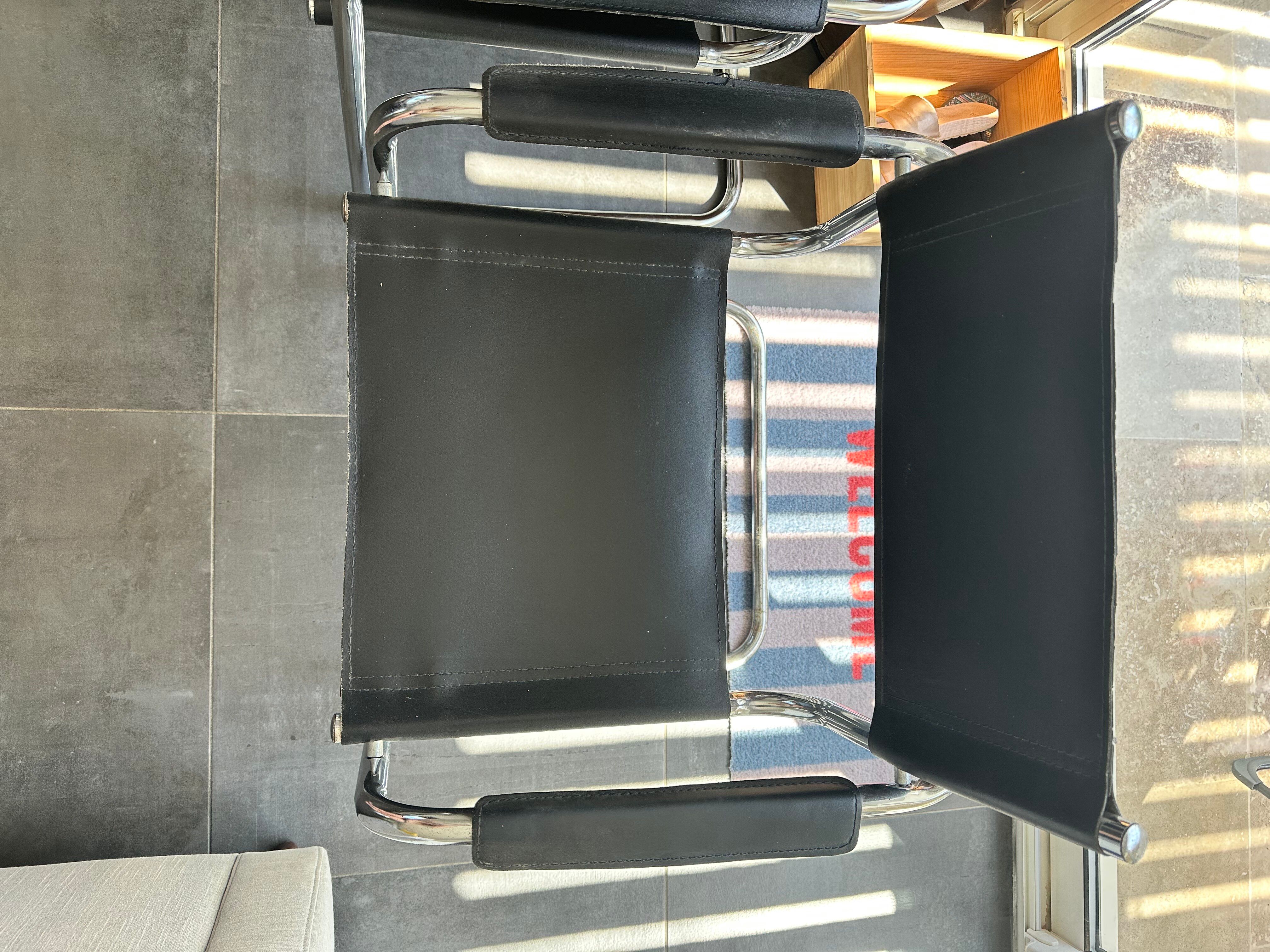 4 chrome tubular chairs