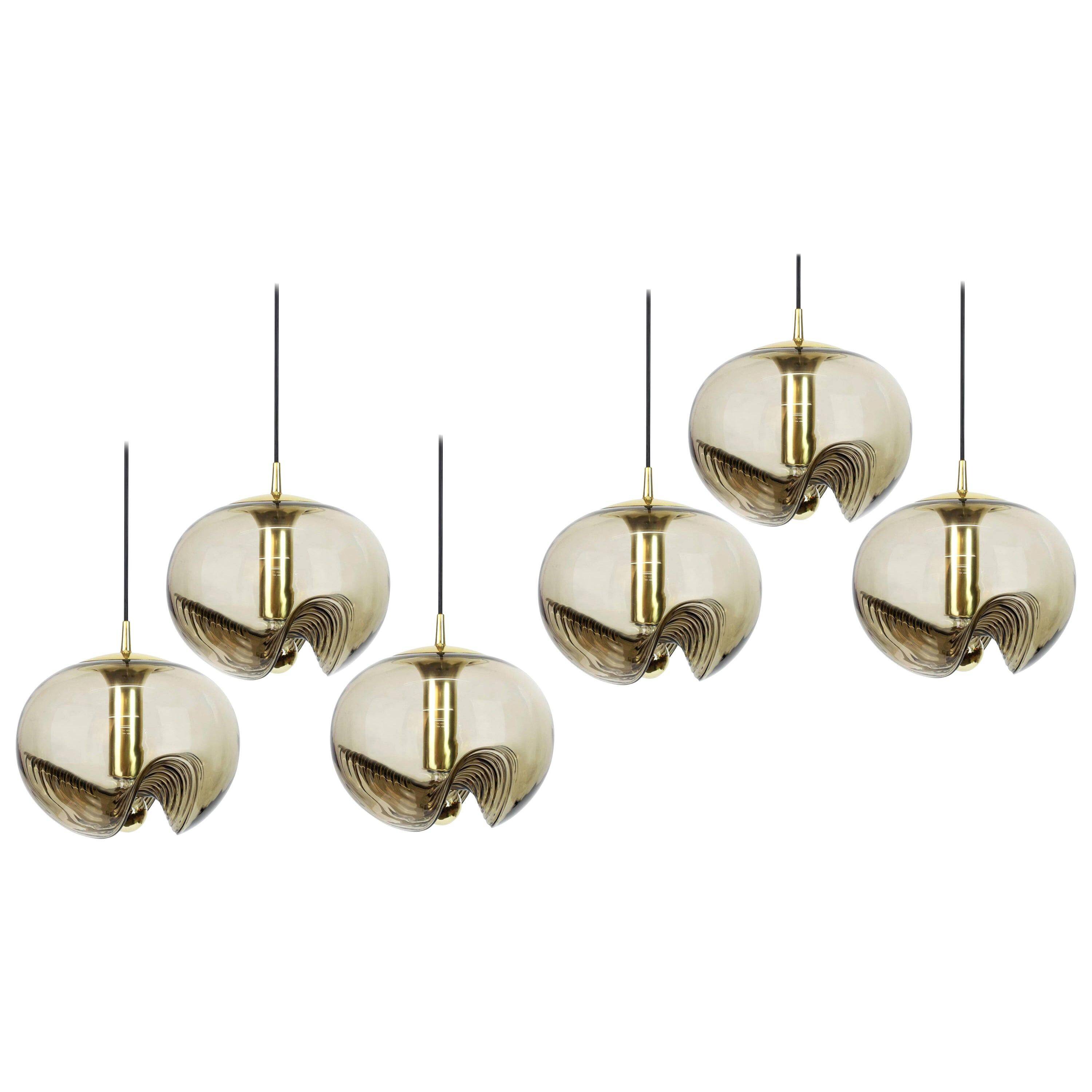Smoked glass pendant chandeliers by Peill & Putzler, Germany, 1970s.
