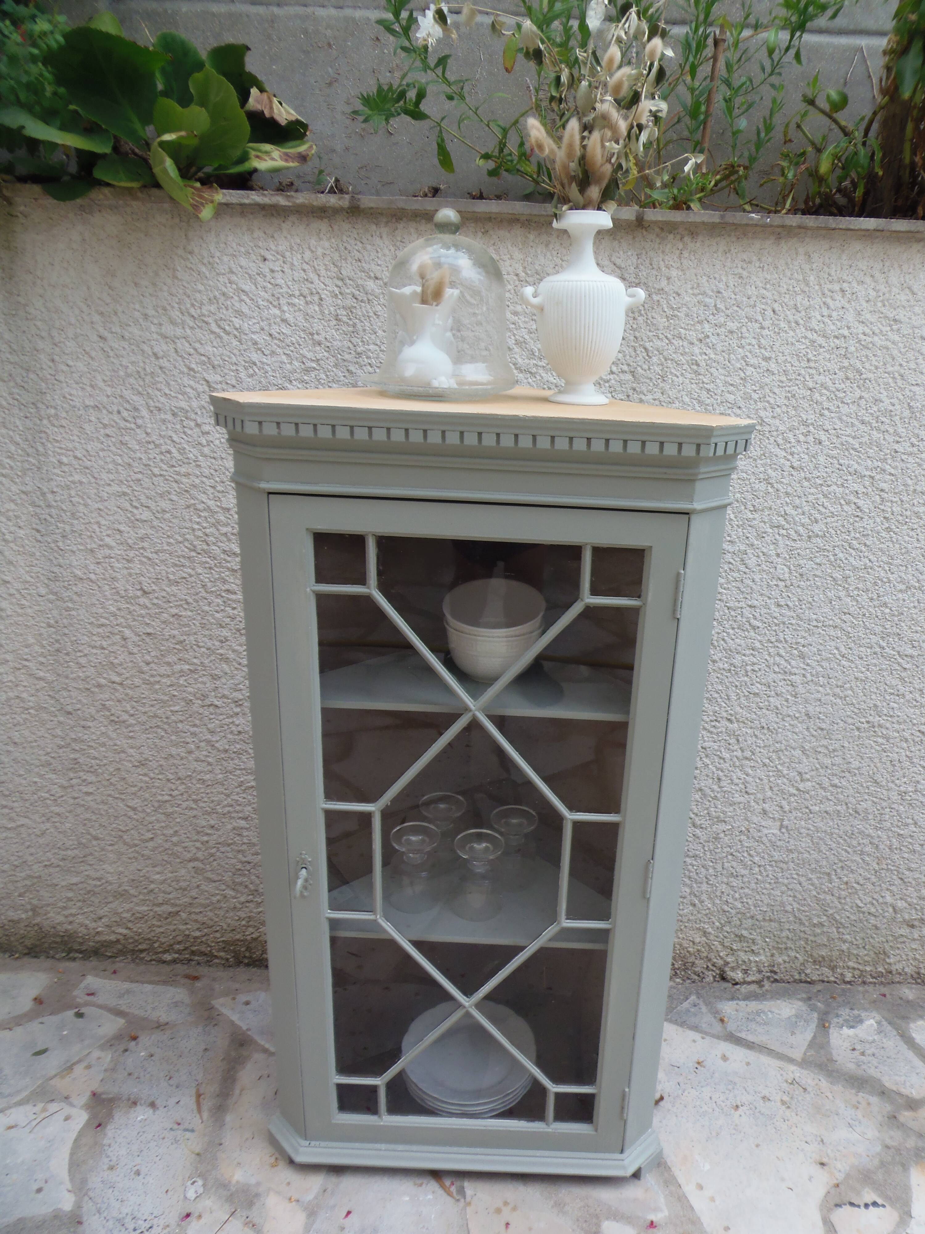 Vintage English corner display cabinet enhanced in grey-green with a wooden top.