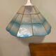 Blue mother-of-pearl suspension
