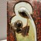 Slim relief with a motif of Madonna and child.