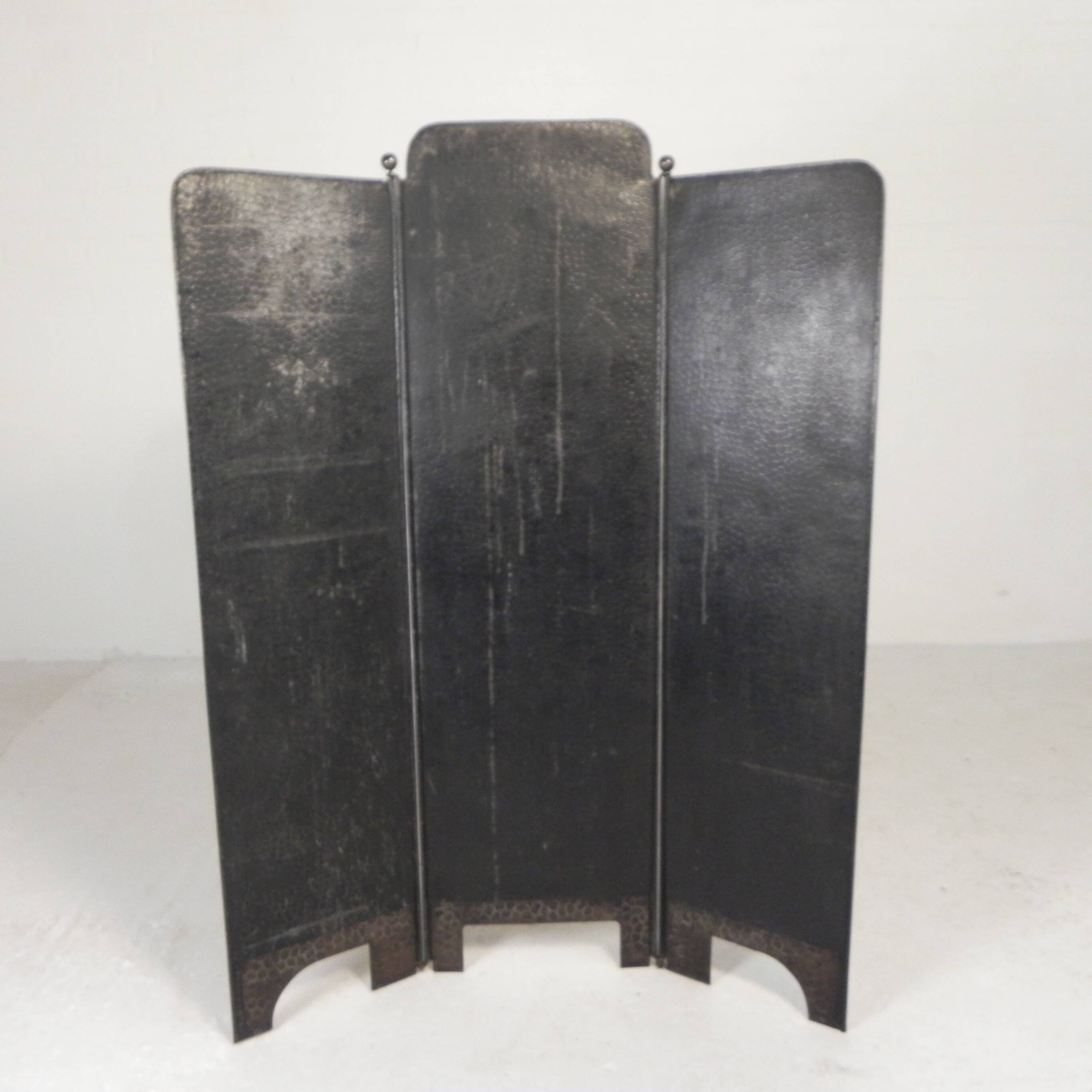 Art Deco screen in steel with brass details, 1930s.