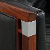 Black cowhide leather and wooden Art Deco design armchair