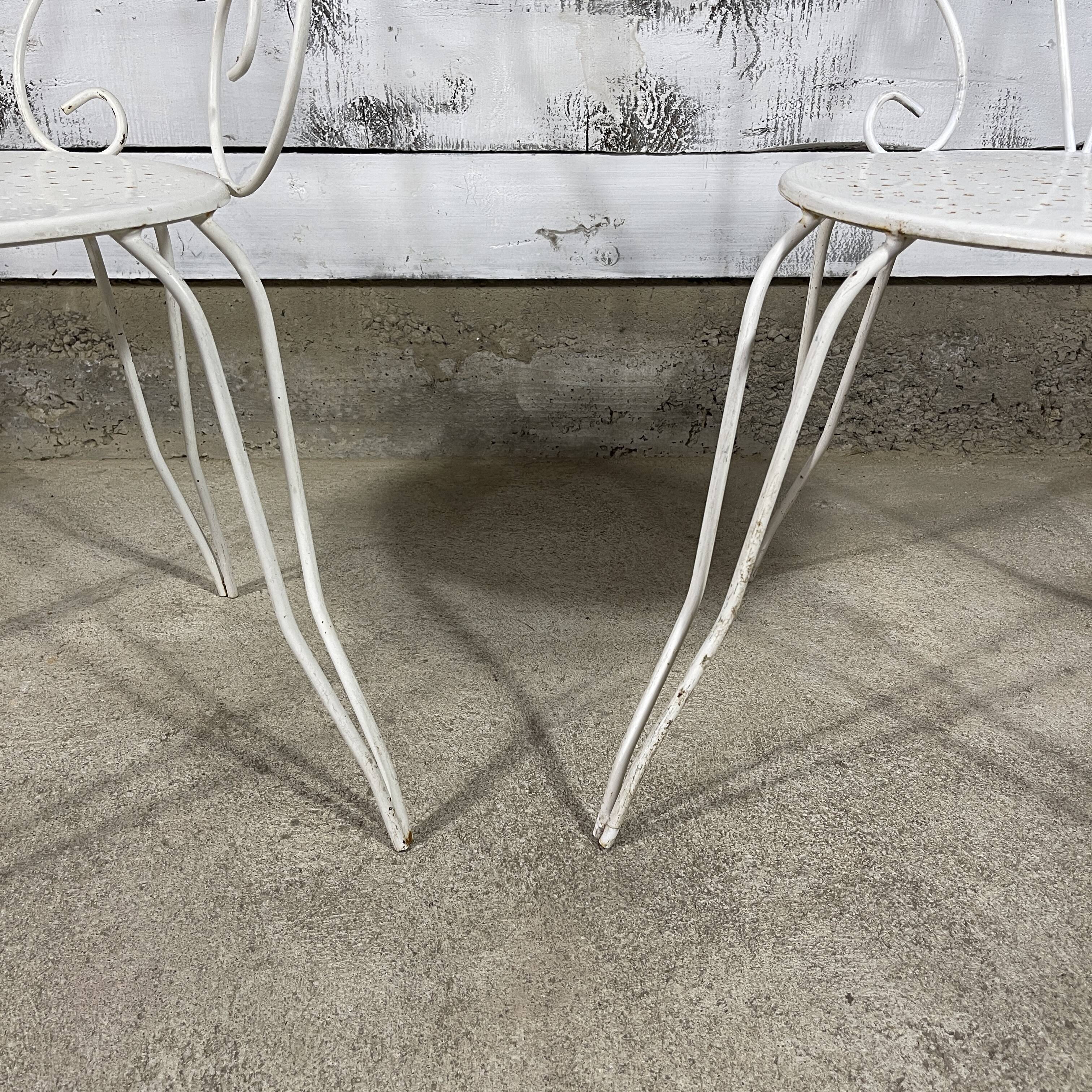 Armchair and garden chair in wrought iron