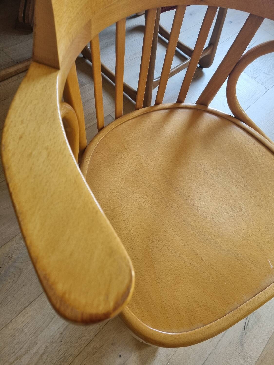 Wooden swivel armchair