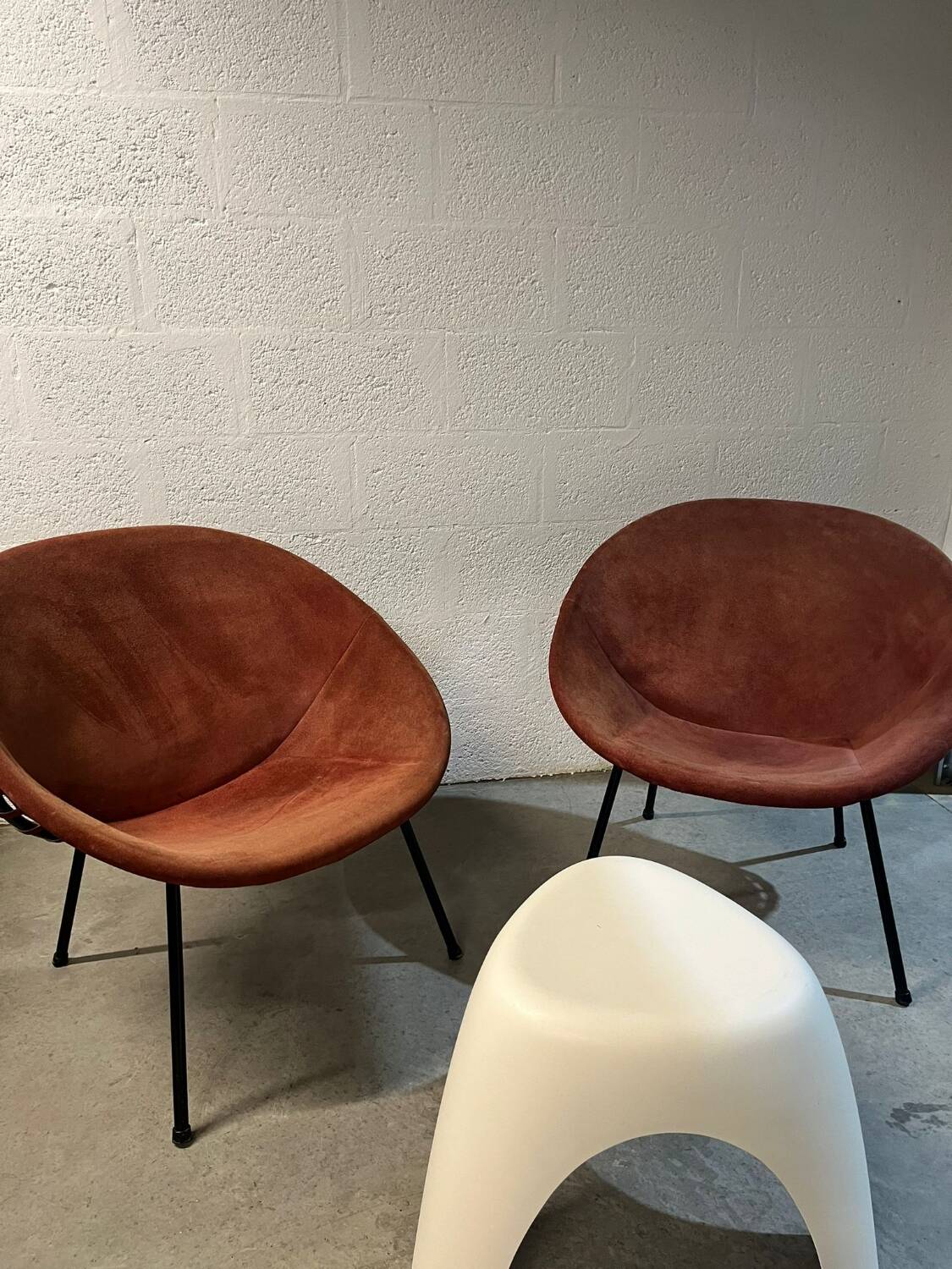 Pair of vintage suede balloon armchairs