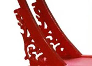 Red shelf with sculpted base