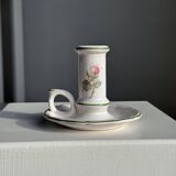 Small vintage hand-held candlestick in earthenware with green trim and floral decoration H10.5