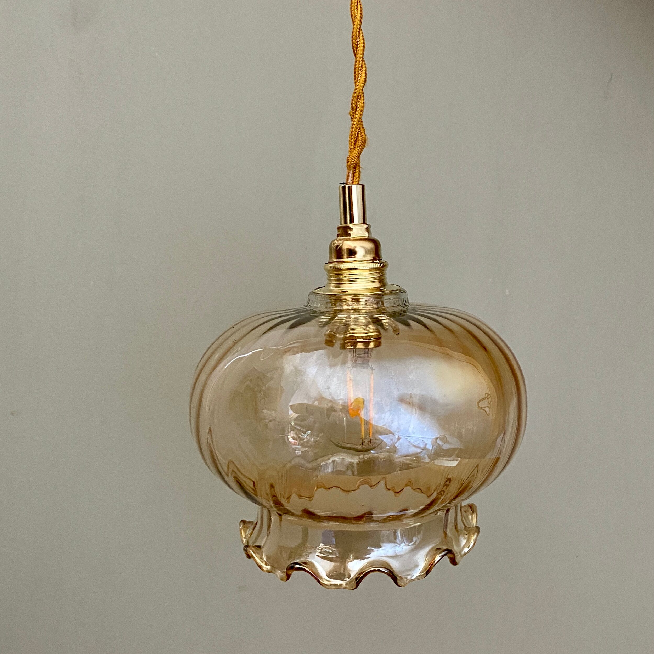 Vintage amber glass globe pendant light