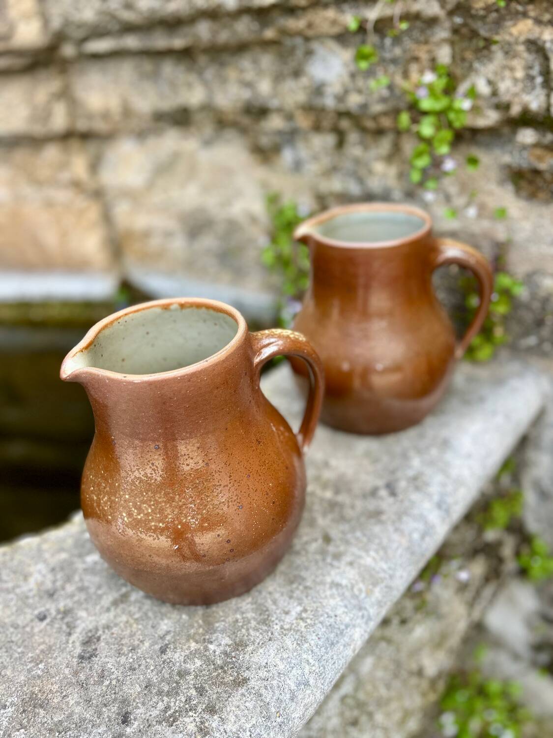 Set of 2 large vintage stoneware pitchers
