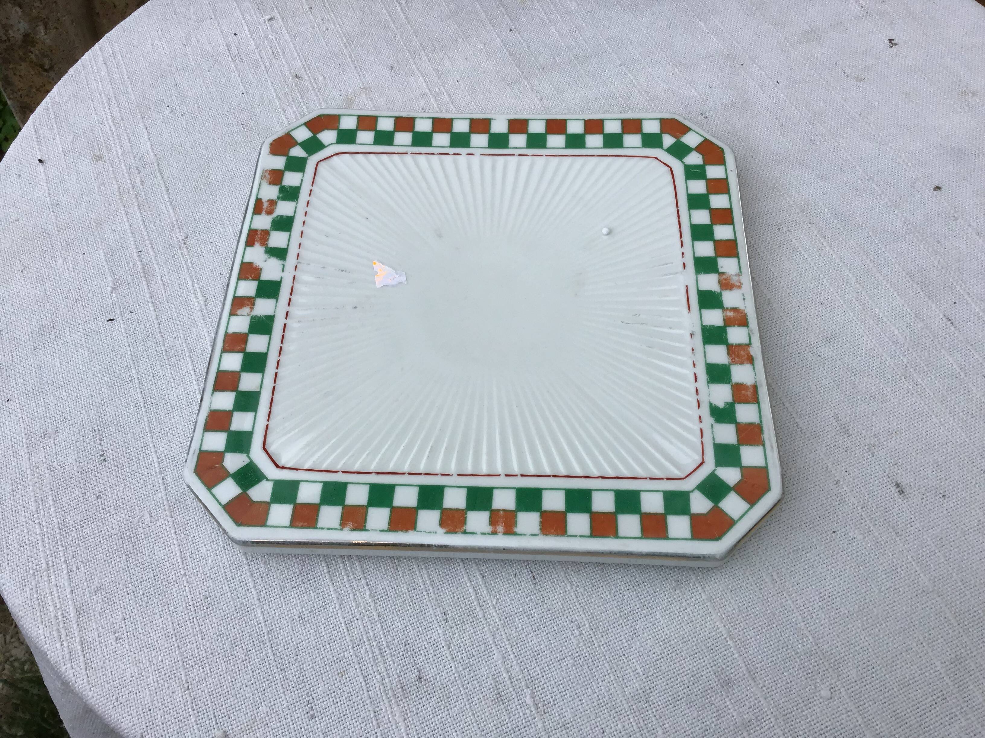 Vintage checkered ceramic trivet