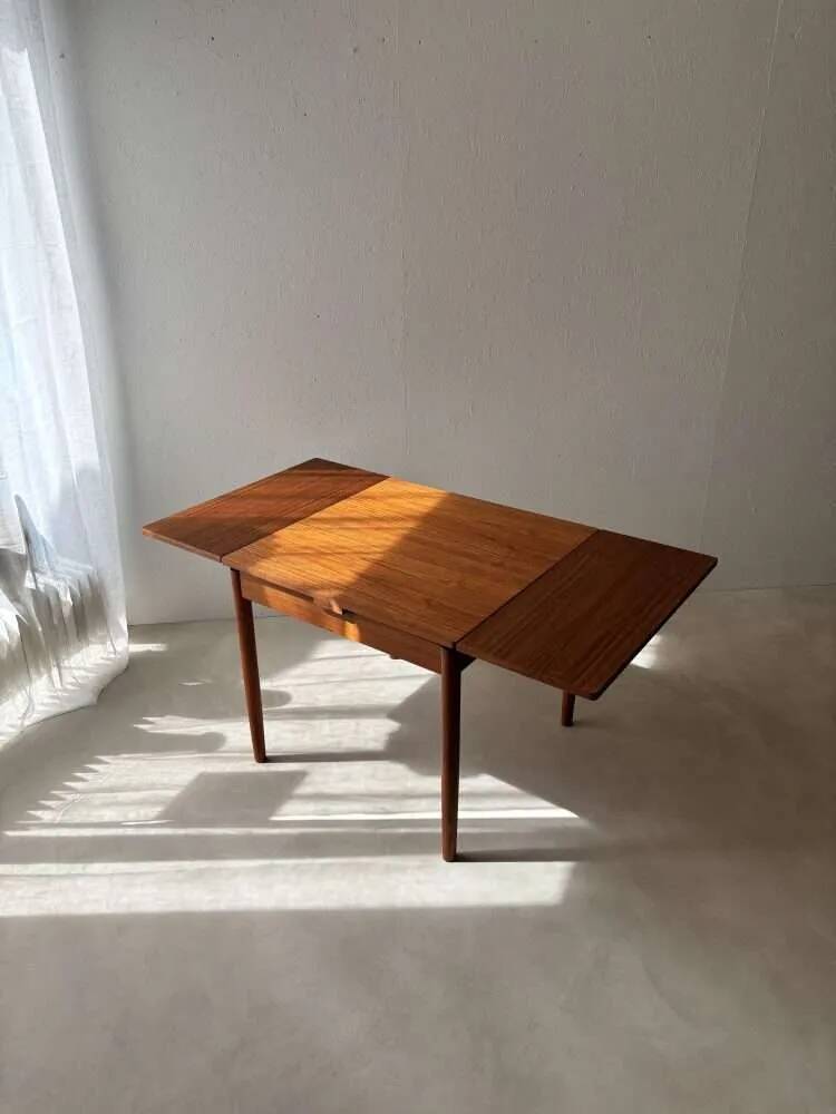 Scandinavian design dining table in solid teak from the 1960s.