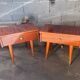 Pair of bedside or night tables in lacquered mahogany with compass feet