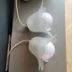 Pair of frosted glass flower pendant lights