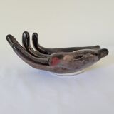 Empty pockets in the shape of a hand